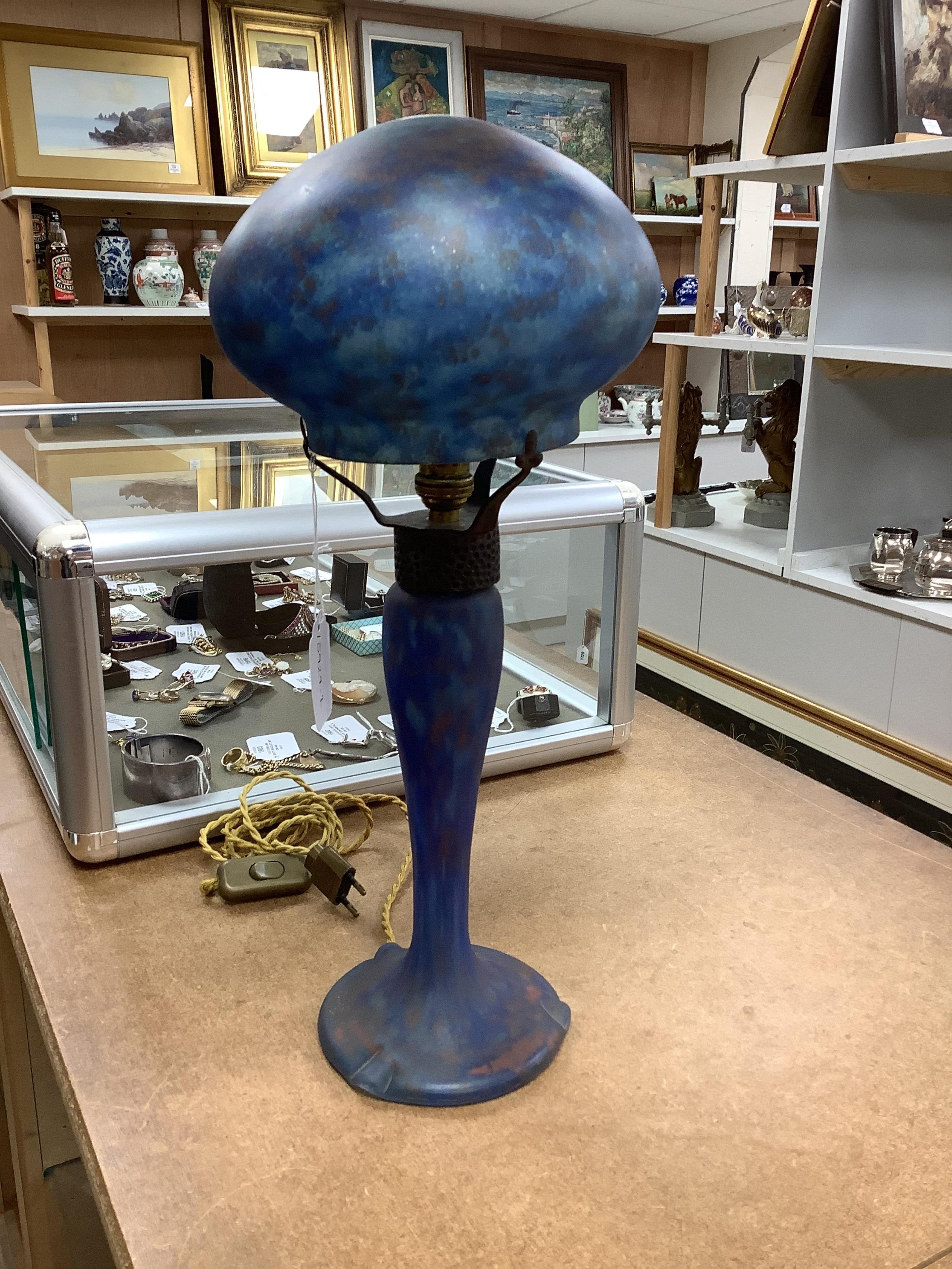 Art Nouveau, ‘Delatte’ mushroom blue glass lamp with hammered metal mount, 45cm high. Condition - good